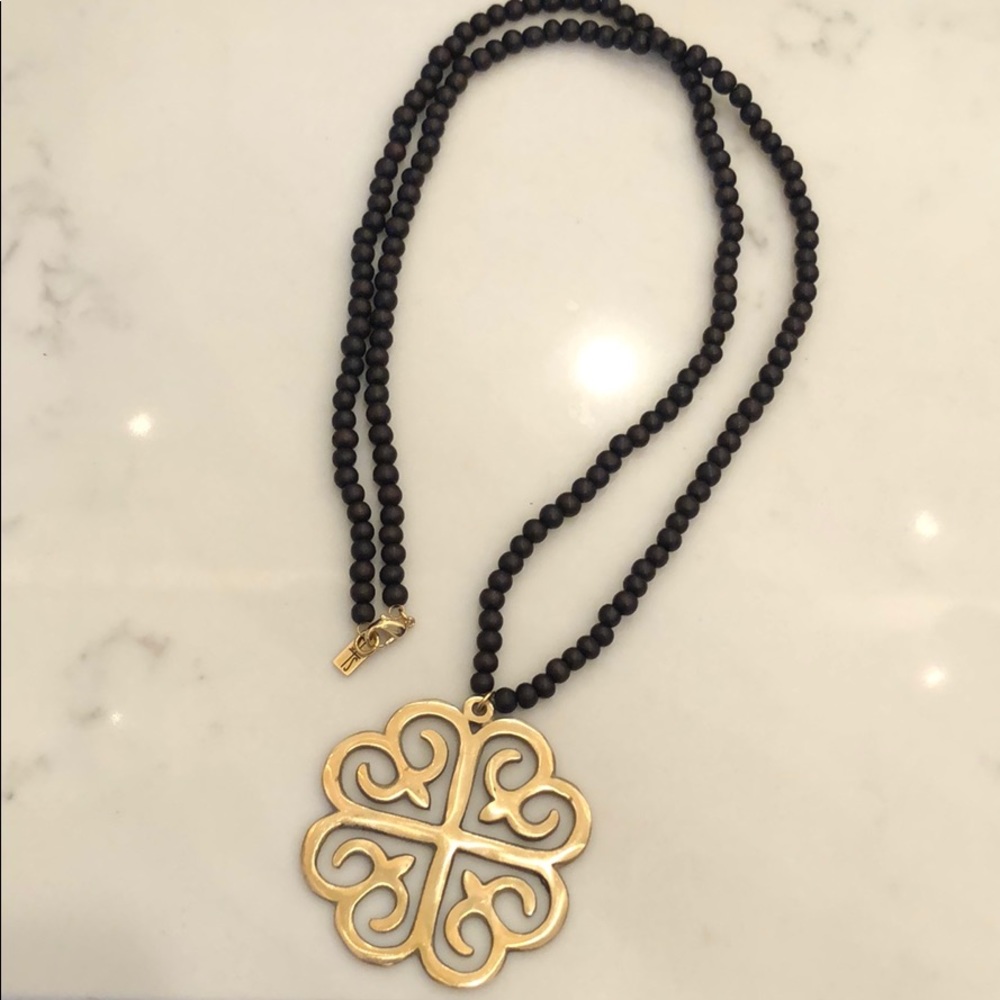 Wood bead necklace with brass/gold medallion